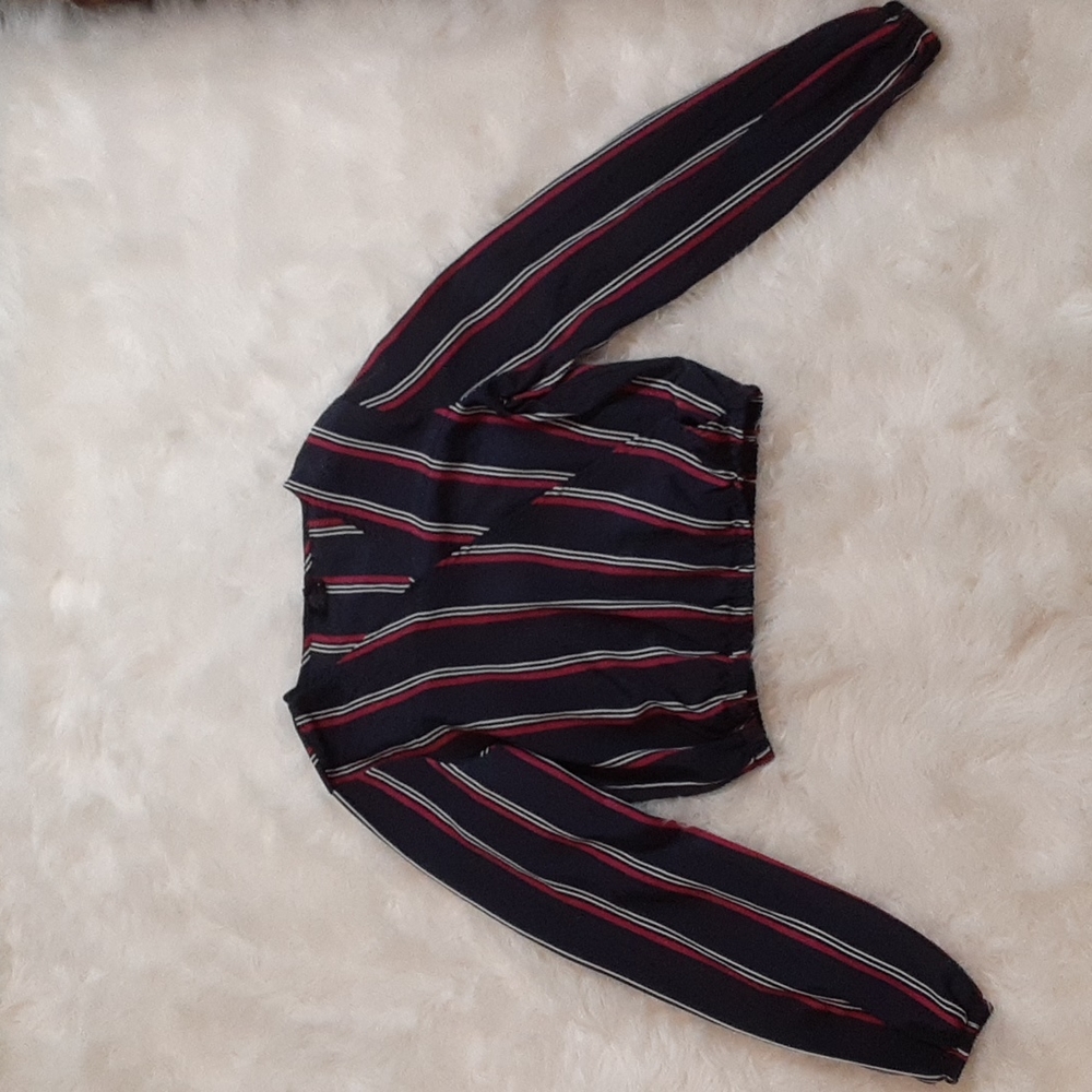 dark blue with red and white striped blouse